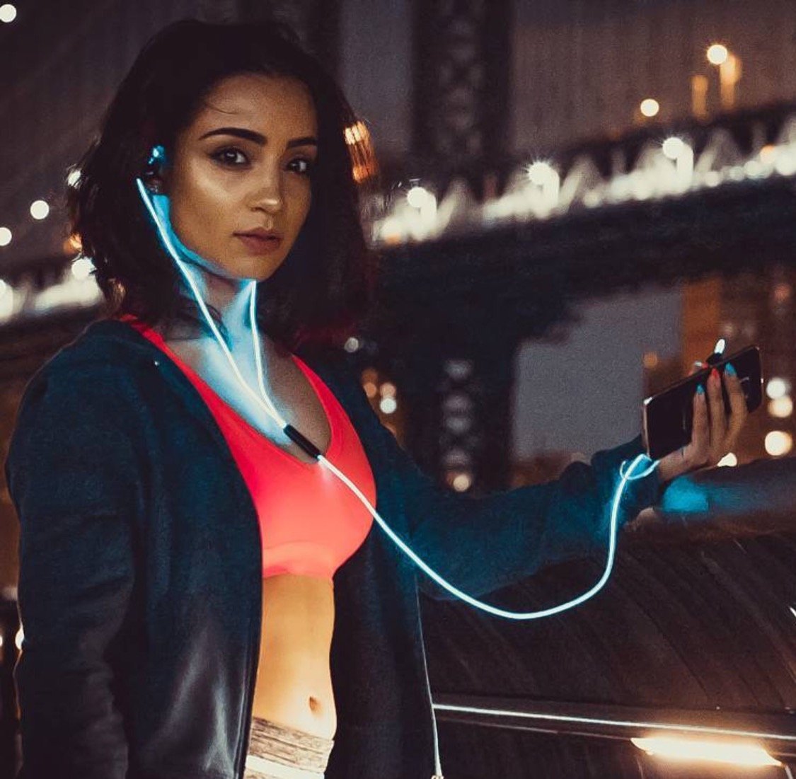 Glowing Earbuds on girl