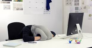 Ostrich Pillow person napping office