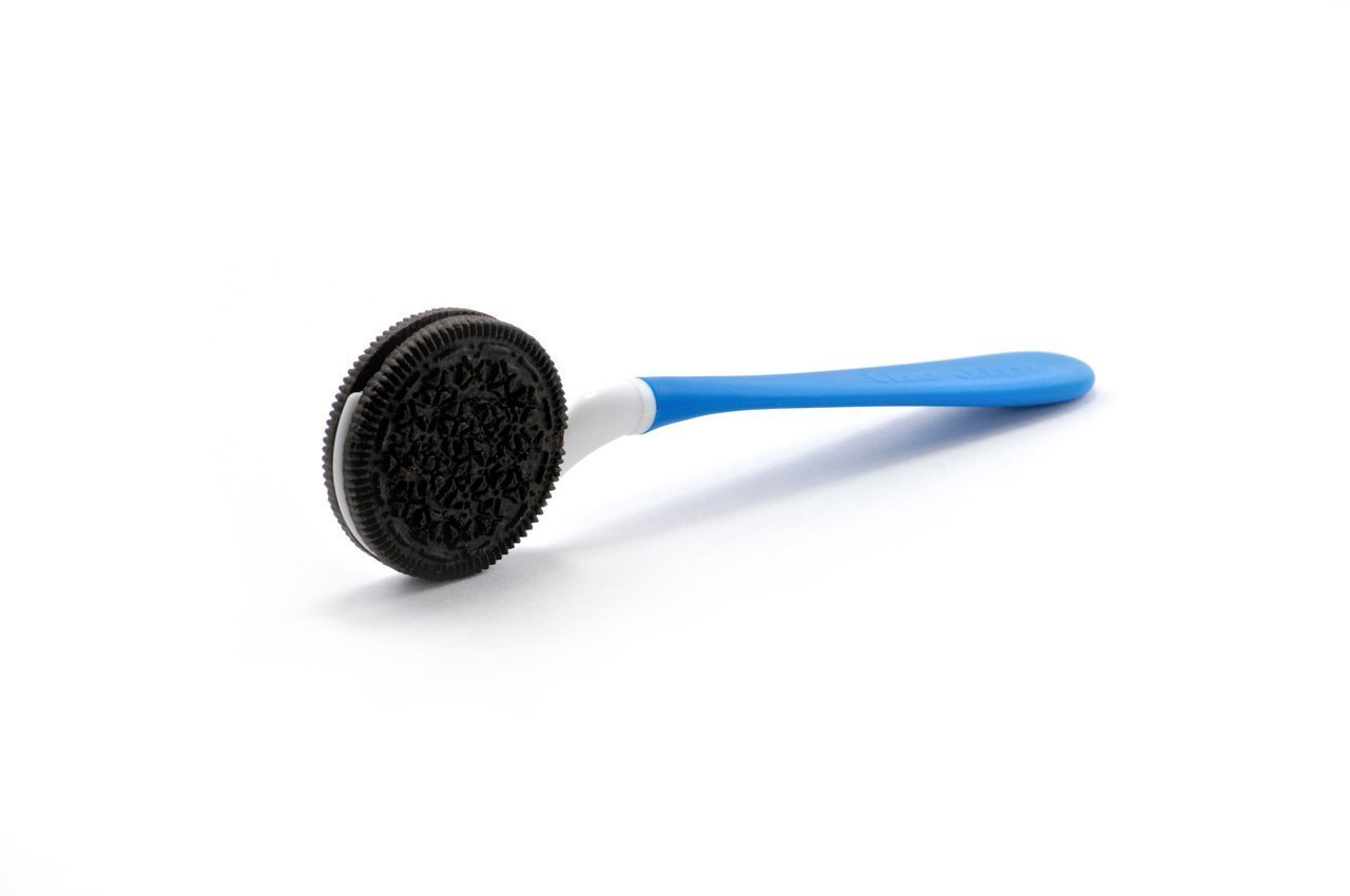 The Dipr cookie holding spoon
